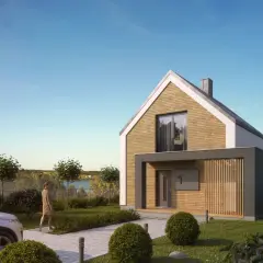 Nowoczesny dom na Mazurach nad jeziorem, z drewnianą elewacją i dużymi oknami.
