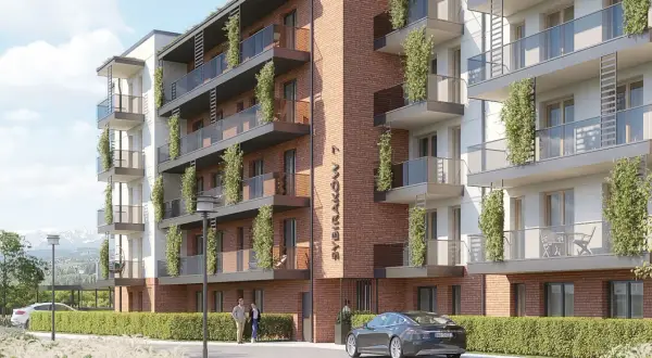 Nowoczesne mieszkania w Nowym Targu, z widokiem na góry. Elegancka architektura, zielone balkony i zadbany teren.