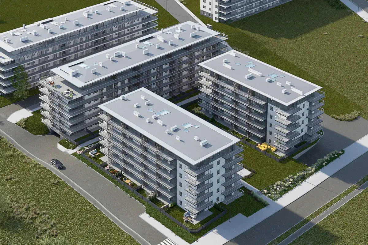 Nowoczesne mieszkania Nowy Targ, wielopiętrowe budynki z balkonami, otoczone zielenią.